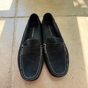 Black men’s suede loafers with white reverse stitching
